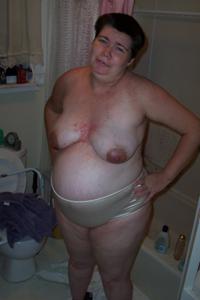 Пожилая жирная женщина - фото #10