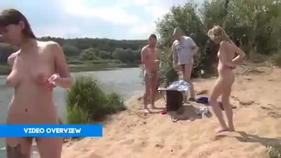 Swingers relax by the river and have an orgy